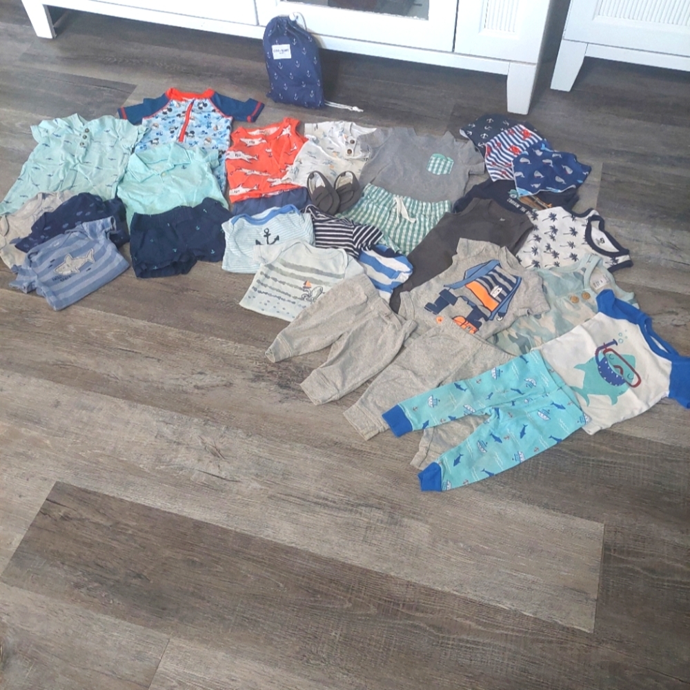 LARGE LOT Baby Clothes. Size varies from 3-6mos.